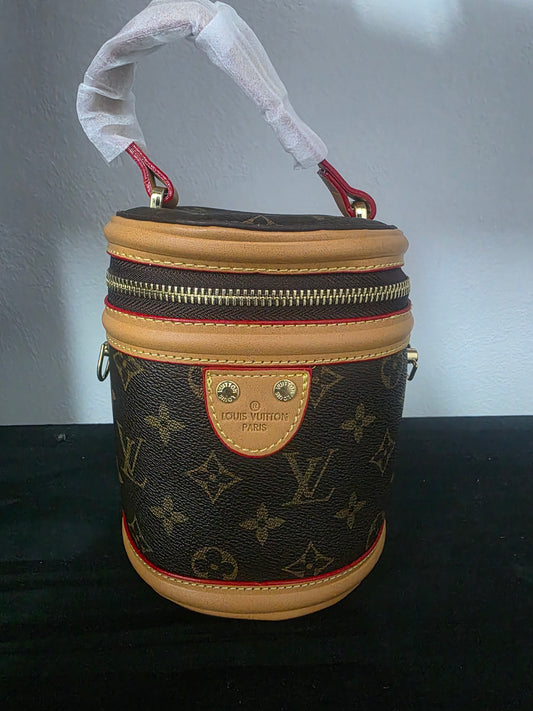 28liv bruin mini Leer