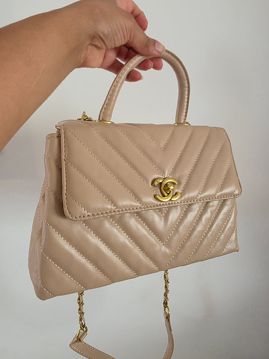 28Cici Trandy beige leer .